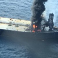 Oil tanker blaze under control, vessel towed to stop drift into shallows