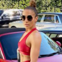 Jennifer Lopez flaunts toned body in red outfit