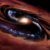 This galaxy surviving a black hole's feast