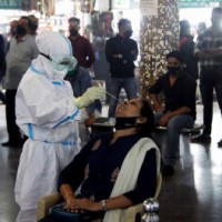 With 30,254 new cases, India's Covid tally reaches 98.5L