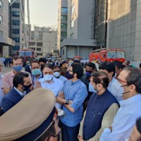 Thackeray visits Serum Institute after fire, loss pegged at Rs 1K cr