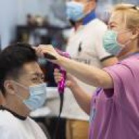 Salons, tattoo shops reopen in England after 4 months