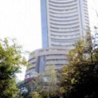 Equity indices trim major initial gains, Sensex up 65 points