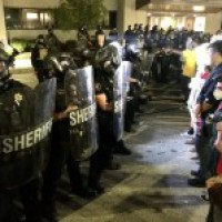 African-American man shot by police 'released from handcuffs'