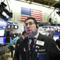 US stocks end mixed after Fed's new approach to inflation
