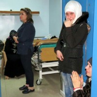 Syria's Damascus hospital drowned in grief and stiches after rocket attack