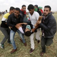 Israel says it will expand response if Gaza clashes go on