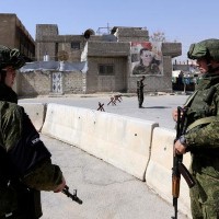 Syria regime strikes rebel enclave as UN aid trucks wait