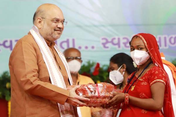 गर्भवती महिलाओं के लिए गृह मंत्री अमित शाह ने शुरू की लड्डू वितरण योजना गर्भवती महिलाओं के लिए गृह मंत्री अमित शाह ने शुरू की लड्डू वितरण योजना