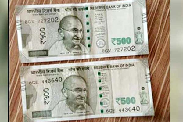 गांधीजी की तस्वीर के पास आरबीआई गवर्नर के सिग्नेचर वाले 500 रुपये के नोट असली या नकली