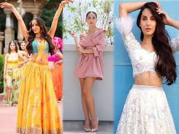 नोरा के स्लिम फिगर और ग्लोइंग स्किन का राज डांस नोरा के स्लिम फिगर और ग्लोइंग स्किन का राज डांस